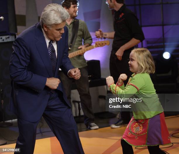 Episode 3425 -- Pictured: Host Jay Leno and actress Maria Lark horse around on August 29, 2007 -- Photo by: Paul Drinkwater/NBCU Photo Bank