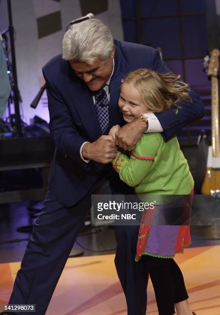 Episode 3425 -- Pictured: Host Jay Leno and actress Maria Lark horse around on August 29, 2007 -- Photo by: Paul Drinkwater/NBCU Photo Bank