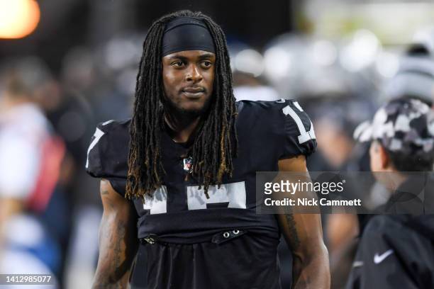 Davante Adams of the Las Vegas Raiders looks on during the first half of the 2022 Pro Hall of Fame Game against the Jacksonville Jaguars at Tom...