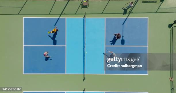 top down aerial view of doubles pickleball game - sports venue aerial stock pictures, royalty-free photos & images