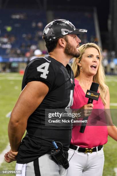 Sports field reporter Melissa Stark interview Derek Carr of the Las Vegas Raiders during the second half of the 2022 Pro Hall of Fame Game against...
