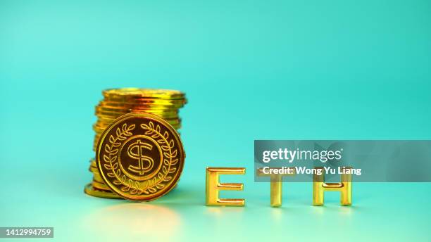 ethereum eth with stock of coins and copyspace - ethereum stockfoto's en -beelden