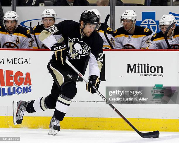 Eric Tangradi of the Pittsburgh Penguins skates against the Boston Bruins during the game at Consol Energy Center on March 11, 2012 in Pittsburgh,...