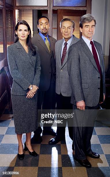 Season 11 -- Pictured: Angie Harmon as Assistant District Attorney Abbie Carmichael, Jesse L. Martin as Detective Ed Green, Jerry Orbach as Detective...