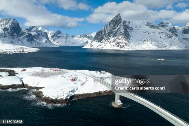 aerial view takean by drone of a iconic fisherman village of sakrisoya during a winter day, lofoten island, norway - moskenesoya stock pictures, royalty-free photos & images