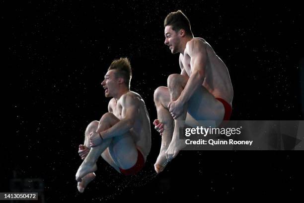 Anthony Hardins and Jack David Laugher of Team England compete in the Men's Synchronised 3m Springboard Final on day eight of the Birmingham 2022...