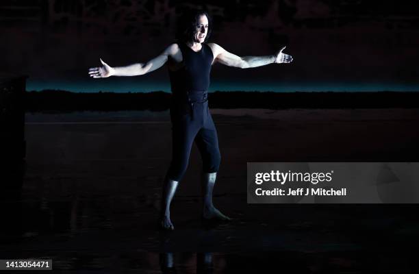 Actor Alan Cumming performs an extract from Burn at the Kings Theatre on August 05, 2022 in Edinburgh, Scotland. This world premiere dance-theatre...