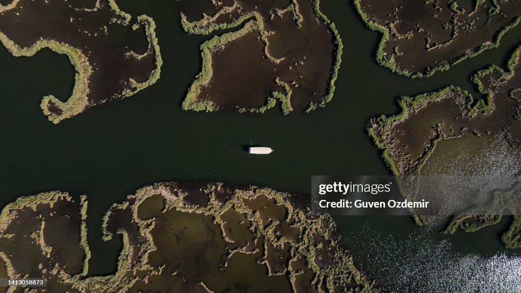 Dalyan Delta, village of Dalyan in Turkey, iztuzu beach Mugla Province, aerial view of lake and reeds, aerial view of lake and reeds, Long beach gorgeous mountains reeds field and wavy sea