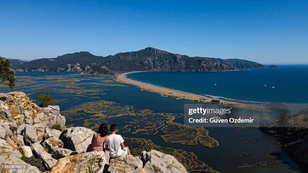 Dalyan Delta, village of Dalyan in Turkey, iztuzu beach Mugla Province, aerial view of lake and reeds, aerial view of lake and reeds, Long beach gorgeous mountains reeds field and wavy sea