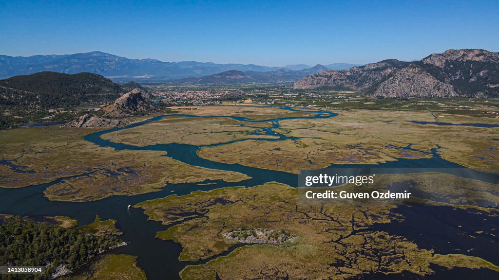 Dalyan Delta, village of Dalyan in Turkey, iztuzu beach Mugla Province, aerial view of lake and reeds, aerial view of lake and reeds, Long beach gorgeous mountains reeds field and wavy sea