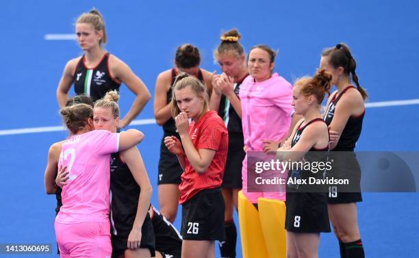 Team Wales look dejected following defeat in the Women's Hockey Classification 7-8 match between Team Wales and Team South Africa on day eight of the...