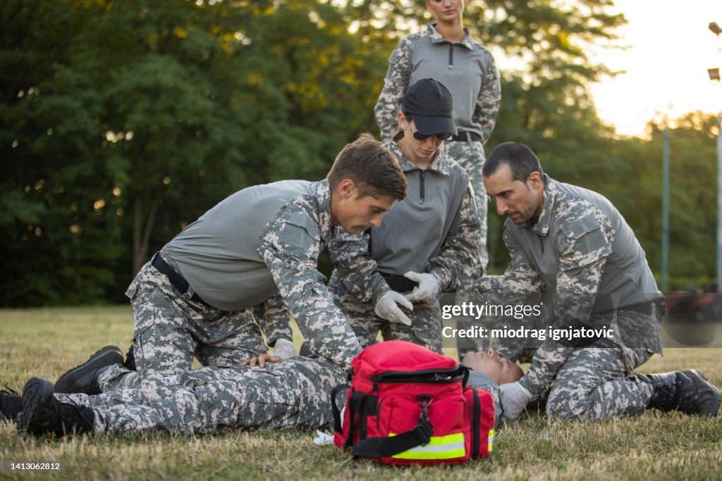 First Aid Army Military Team Having An First Aid Training Course High-Res Stock Photo ...
