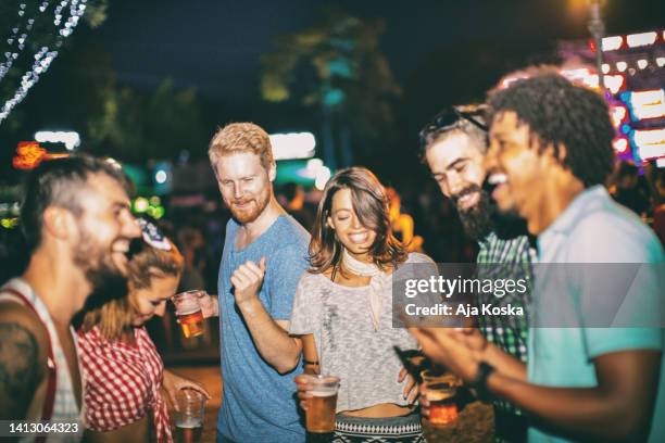 friends dancing at a concert. - white nights festival imagens e fotografias de stock