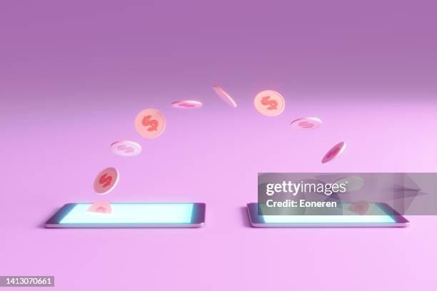 money transfer between smart phones - money transfer stock pictures, royalty-free photos & images
