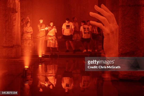 Tourists visit Istanbul's famous Basilica Cistern on August 05, 2022 in Istanbul, Turkey. The historic site recently reopened to the public after...