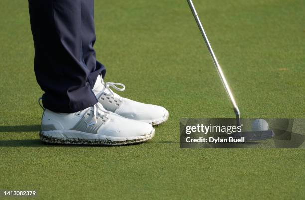 Detail view of the shoes of Rickie Fowler of the United States on the 12th green during the second round of the Wyndham Championship at Sedgefield...