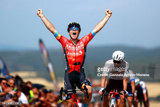 Matevz Govekar of Slovenia and Team Bahrain Victorious celebrates winning ahead of Valentin Retailleau of France and Ag2R Citroen Team during the...