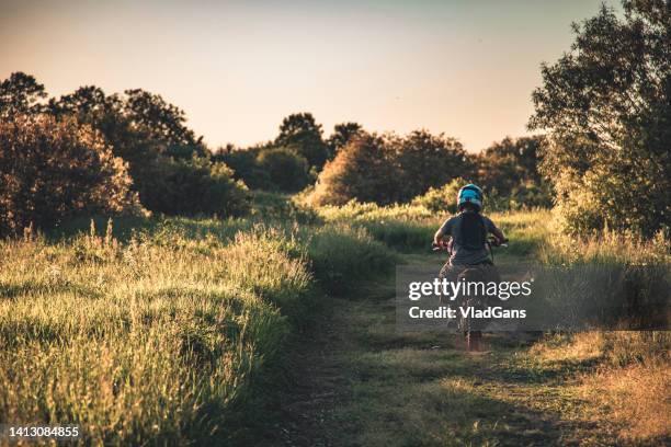 teenagers riding scooter. - voting district stock pictures, royalty-free photos & images