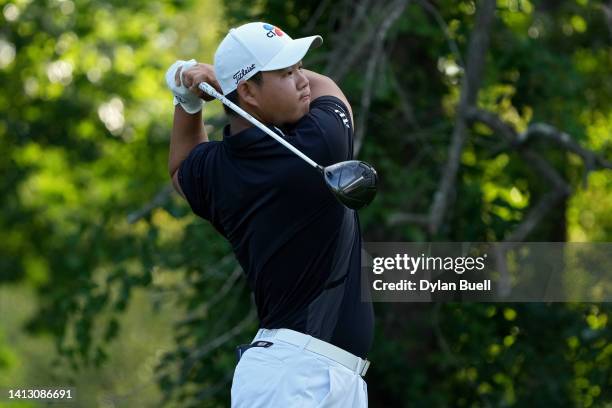 Joohyung Kim of South Korea plays his shot from the 13th tee during the second round of the Wyndham Championship at Sedgefield Country Club on August...