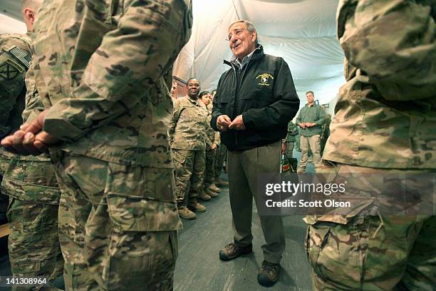 Secretary of Defense Leon Panetta greets troops passing through the Transit Center at Manas on March 14, 2012 near Bishkek, Kyrgyzstan. All U.S....