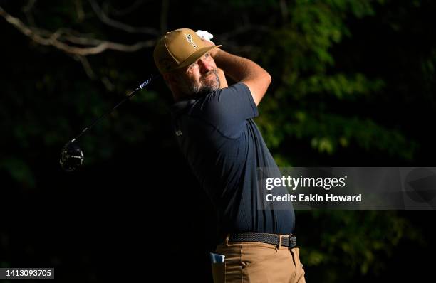 Ryan Moore of the United States plays his shot from the second tee during the second round of the Wyndham Championship at Sedgefield Country Club on...