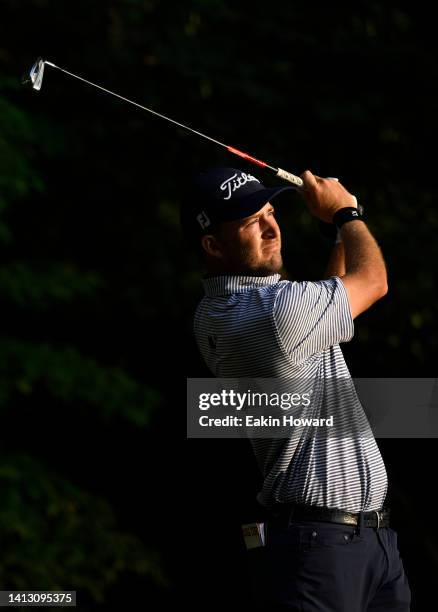 Lee Hodges of the United States plays his shot from the second tee during the second round of the Wyndham Championship at Sedgefield Country Club on...