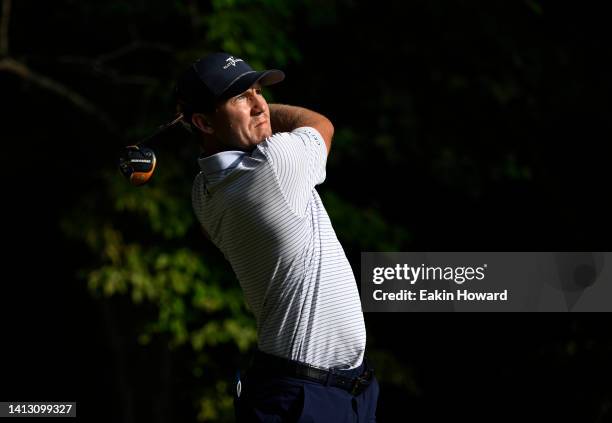Kramer Hickok of the United States plays his shot from the second tee during the second round of the Wyndham Championship at Sedgefield Country Club...