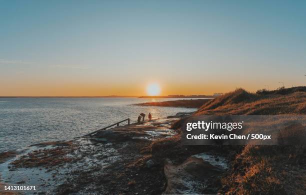 scenic view of sea against clear sky during sunset,la perouse,new south wales,australia - nsw stock pictures, royalty-free photos & images