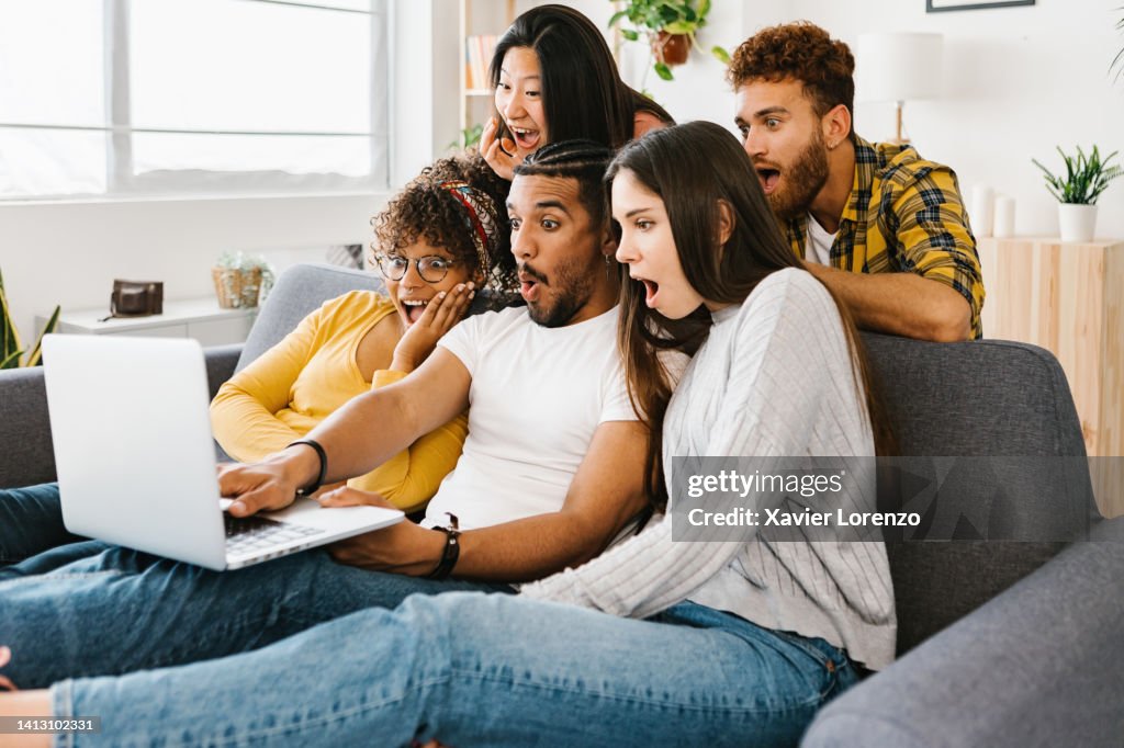 Computer System Friends Surprised Young Group Of Multiracial Friends Using Laptop Computer ...