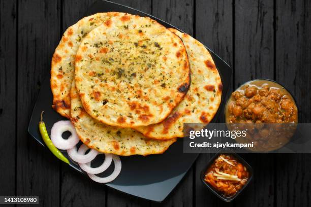 amritsari kulche and chole - paratha stock pictures, royalty-free photos & images