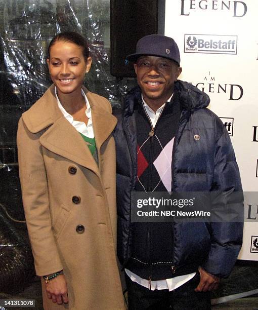 Am Legend" Premiere -- Pictured: Model Porschla Coleman and Russell Simmons attend the premiere of "I Am Legend" at the WaMu Theater at Madison...