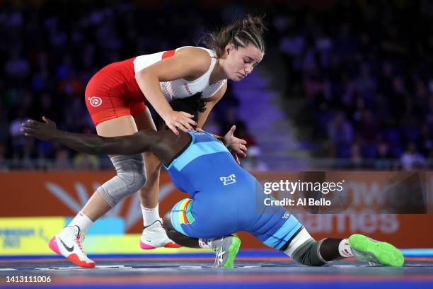 Berthe Emilienne Etane Ngolle of Team Cameroon competes against Kelsey Barnes of Team England during the Women's Freestyle Wrestling 62 kg Bronze...