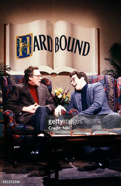 Episode 11 -- Pictured: Christopher Walken as Steven Pressman, Kevin Nealon as Norman Stiles during the 'Hardbound' skit on January 20, 1990 --