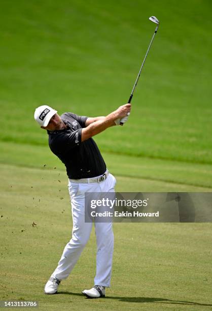 David Skinns of England plays a shot on the 14th hole during the second round of the Wyndham Championship at Sedgefield Country Club on August 05,...