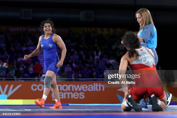 Sakshi Malik of Team India celebrates after defeating Ana Godinez Gonzalez of Team Canada during the Women's Freestyle 62 kg Gold Medal match on day...