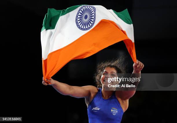 Sakshi Malik of Team India celebrates after defeating Ana Godinez Gonzalez of Team Canada during the Women's Freestyle 62 kg Gold Medal match on day...