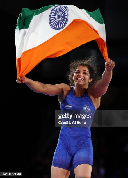 Sakshi Malik of Team India celebrates after defeating Ana Godinez Gonzalez of Team Canada during the Women's Freestyle 62 kg Gold Medal match on day...