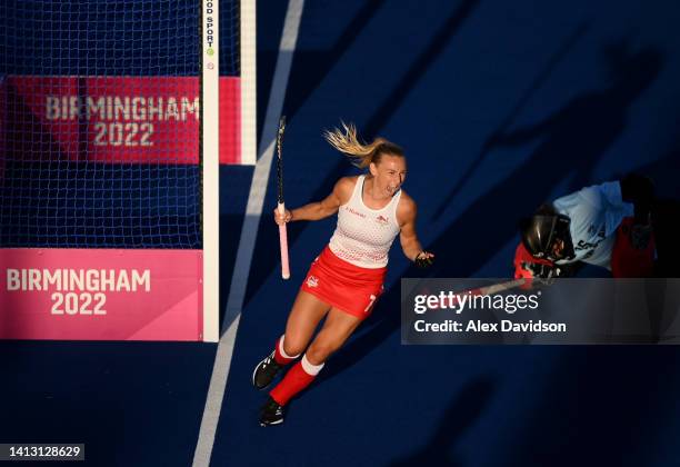 Hannah Martin of Team England celebrates the winning goal in the penalty shoot out during the Women's Hockey Semi-Final match between Team England...