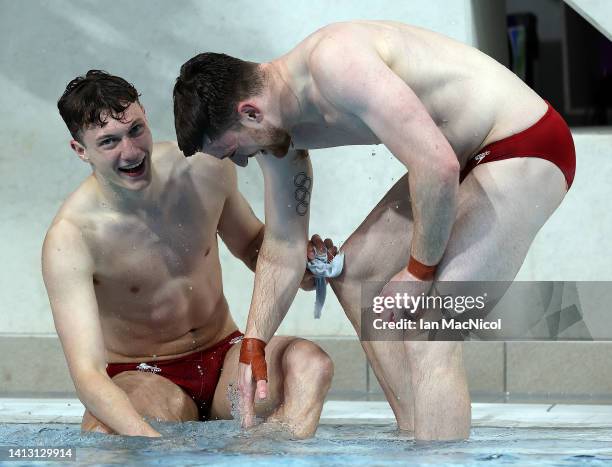 Matthew Lee and Noah Oliver Williams of Team England celebrate winning the Men's Synchronised 10m Platform final on day eight of the Birmingham 2022...