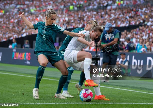 Ellen White of England and Kathrin-Julia Hendrich of Germany in action during the UEFA Women's Euro England 2022 final match between England and...