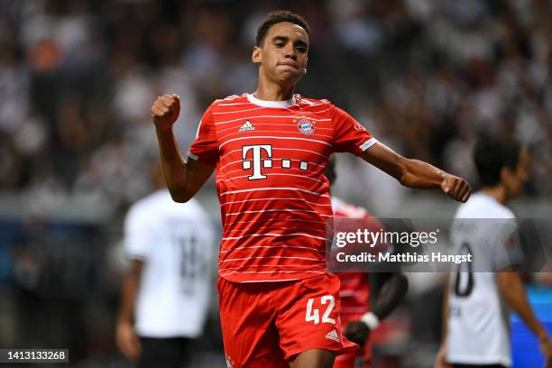 Jamal Musiala of Bayern Munich celebrates scoring their side's sixth goal during the Bundesliga match between Eintracht Frankfurt and FC Bayern...