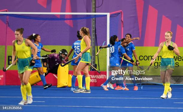 Vandana Katariya of Team India celebrates with teammates after scoring their side's first goal during the Women's Hockey Semi-Final match between...