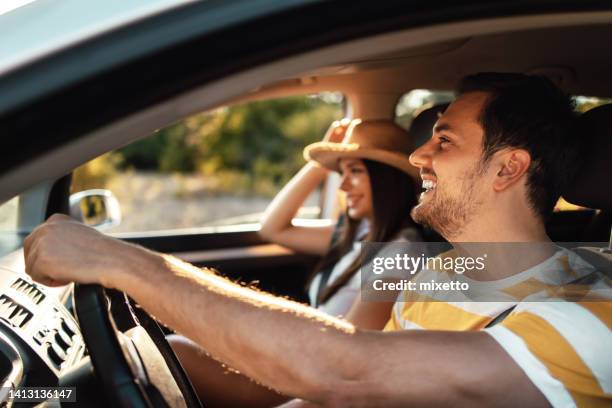 these road trips are amazing with you by my side - two cars side by side stock pictures, royalty-free photos & images