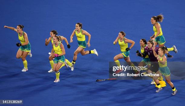 Team Australia celebrate after victory in the Women's Hockey Semi-Final match between Team Australia and Team India on day eight of the Birmingham...