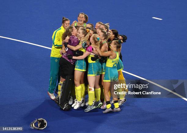 Team Australia celebrate after victory in the Women's Hockey Semi-Final match between Team Australia and Team India on day eight of the Birmingham...