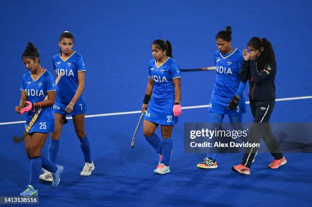 Kaur Navneet, Devi Sharmila, Neha and Deep Grace Ekka of Team India look dejected following defeat in the Women's Hockey Semi-Final match between...