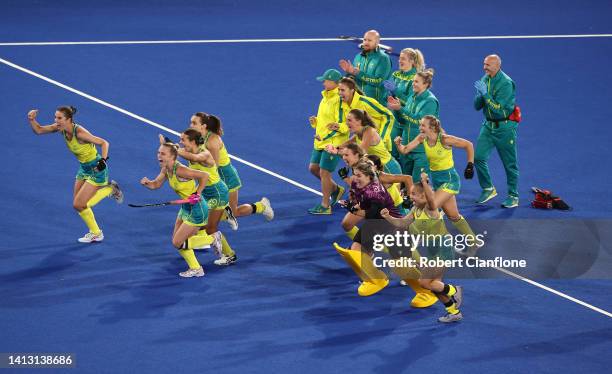 Team Australia celebrate after victory in the Women's Hockey Semi-Final match between Team Australia and Team India on day eight of the Birmingham...