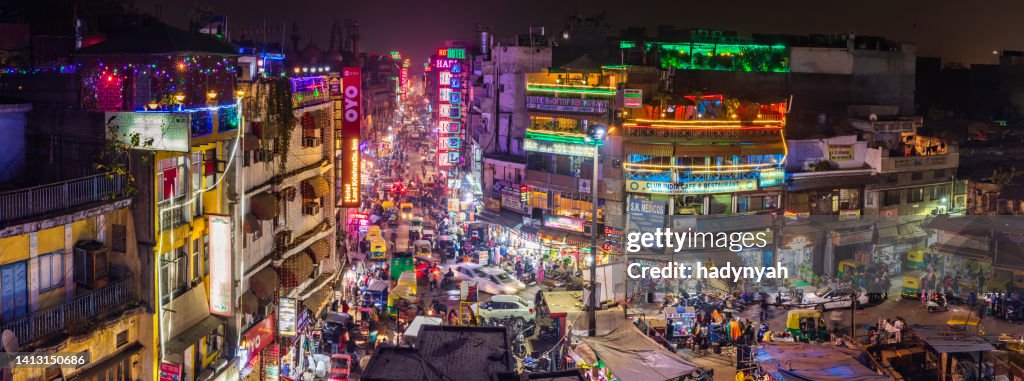 City life - Main Bazar in Delhi by night, India