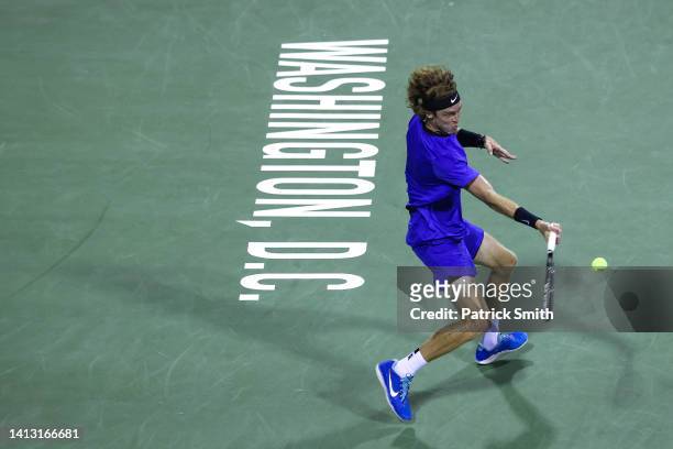 Andrey Rublev returns a shot against J.J. Wolf of the United States during Day 7 of the Citi Open at Rock Creek Tennis Center on August 5, 2022 in...