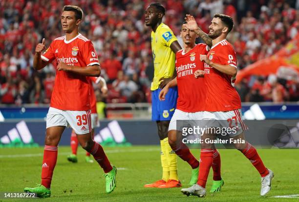 Rafa Silva of SL Benfica celebrates with teammates after scoring a goal during the Liga Portugal Bwin match between SL Benfica and FC Arouca at...